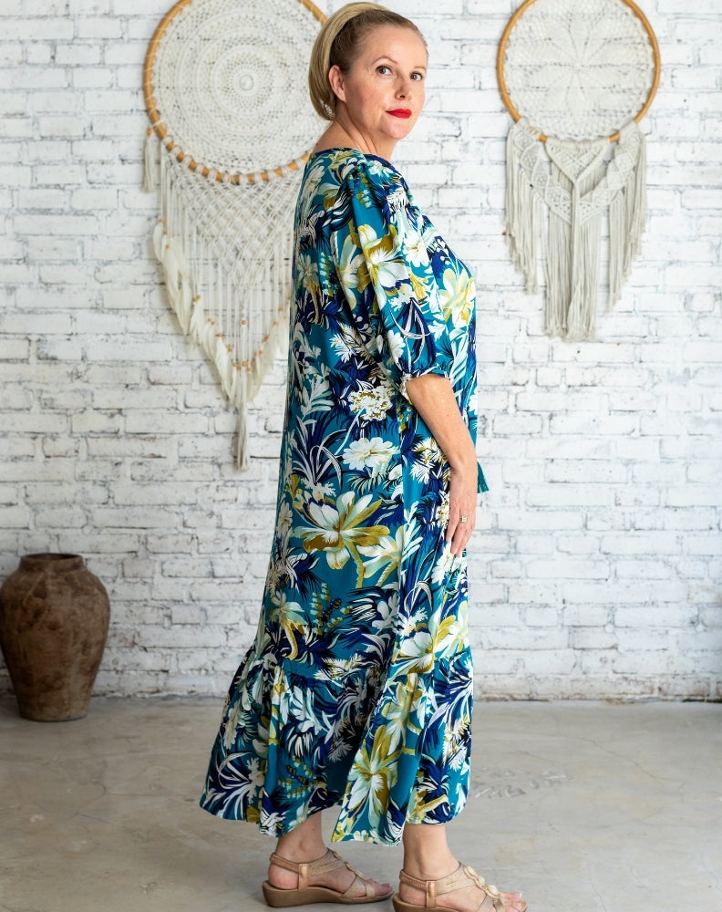 miss seafari naudic midi dress on size 16 model showing tropical print
