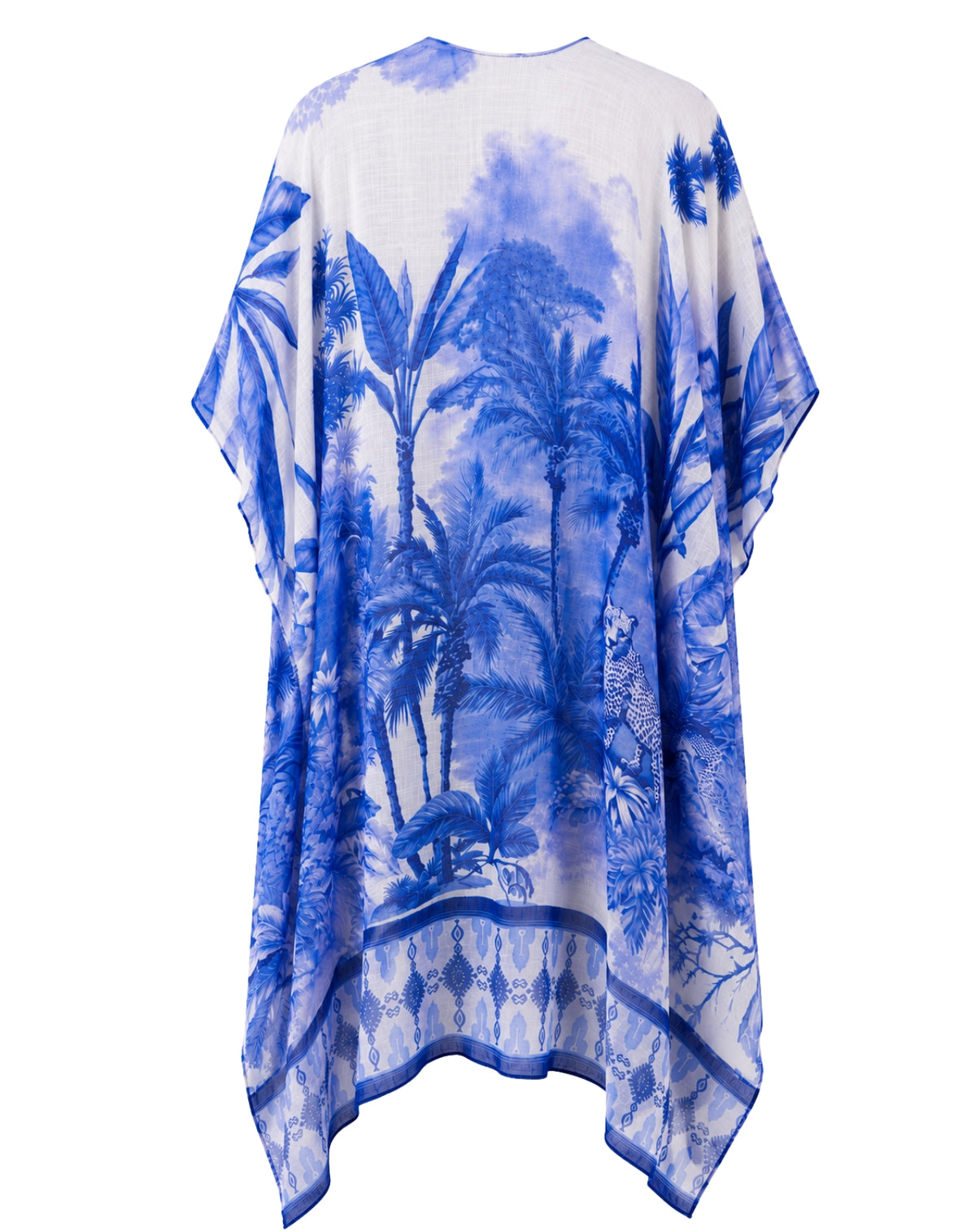 A blue and white tropical print kaftan or poncho-style cover-up with palm trees, a leopard, and a decorative border, shown against a plain white background.