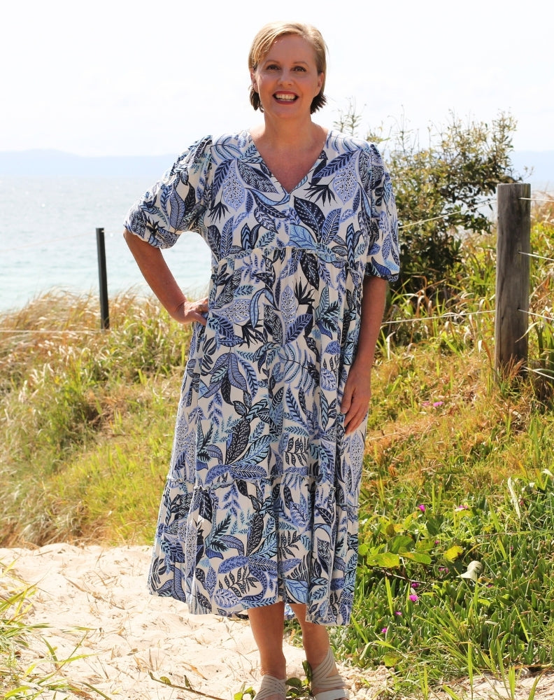 Size 16 model wearing boho midi dress by miss seafari