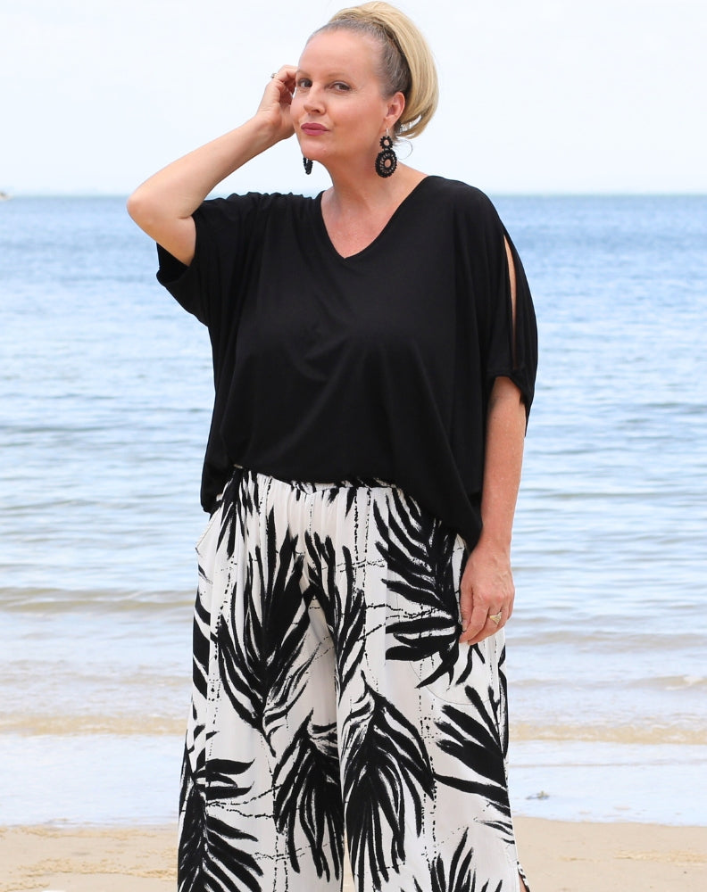 cold shoulder top in black modal by miss seafari