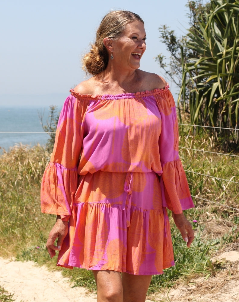 fiesta dress in orange palms worn with belt shown on size 10 to 12 woman
