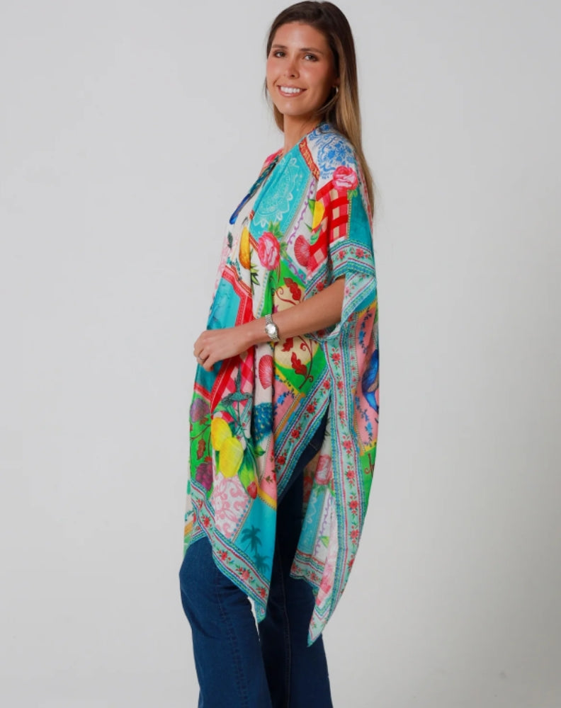 Size 10 woman woman wearing a holiday kimono on a plain background