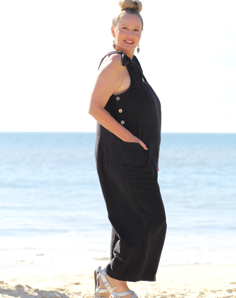 tiestrap jumpsuit in black cotton by miss seafari showing deep front pockets