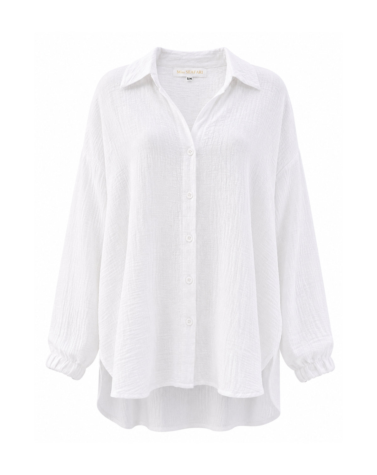 A white long-sleeve button-up shirt with a relaxed, oversized fit, featuring a pointed collar, subtle vertical crinkle texture, and elasticized cuffs, shown against a plain white background.