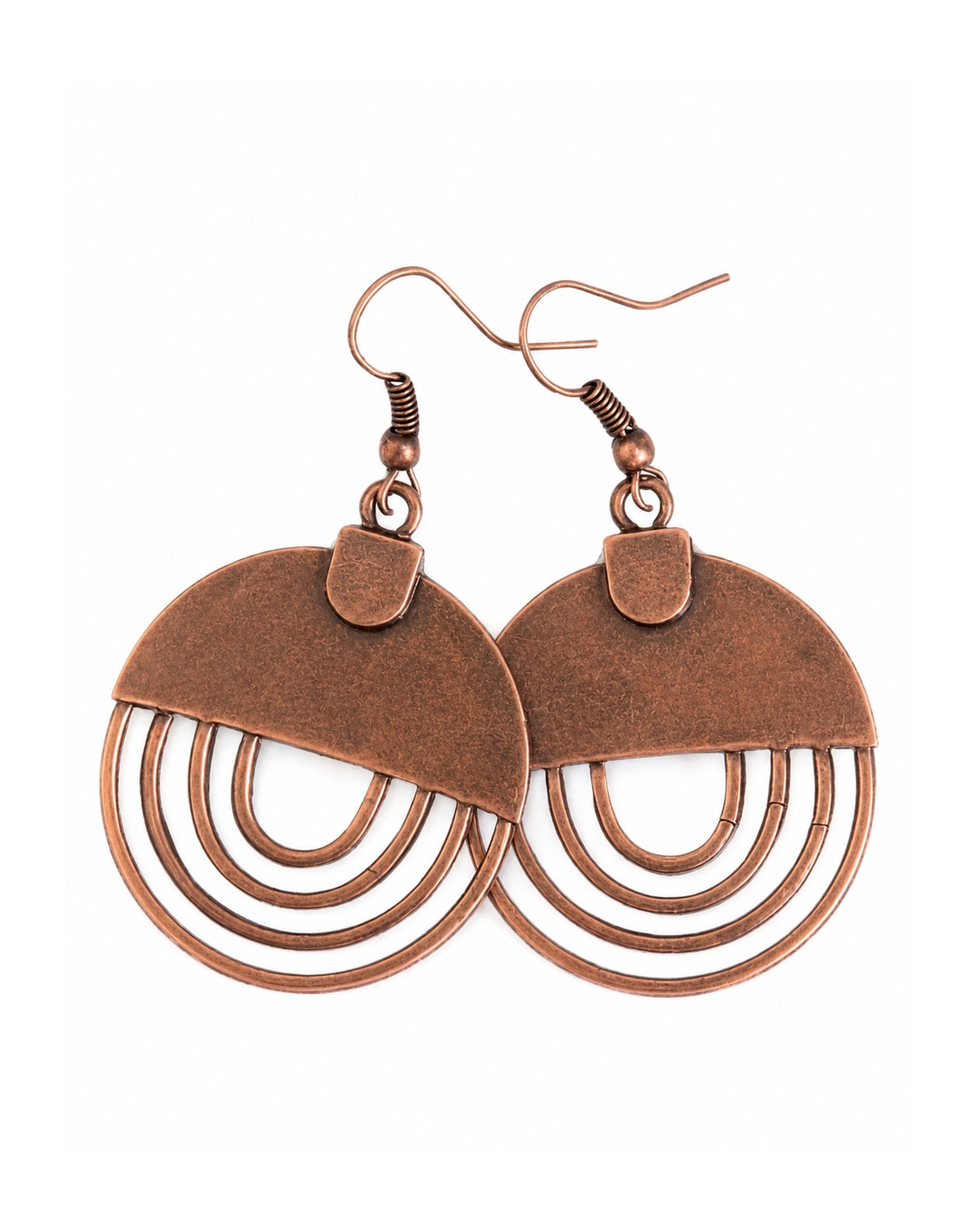 A pair of copper-toned geometric dangle earrings with semi-circular top plates and multiple concentric open rings below, shown on a plain white background.