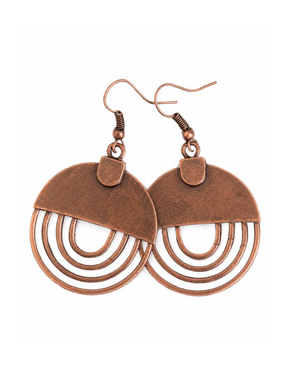 A pair of copper-toned geometric dangle earrings with semi-circular top plates and multiple concentric open rings below, shown on a plain white background.