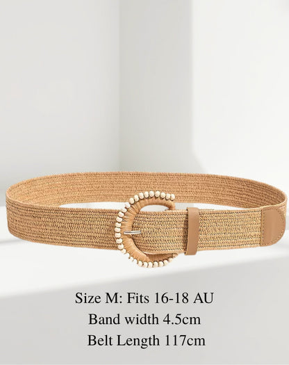 Rattan woven elasticised belt with a beaded buckle on a white background
