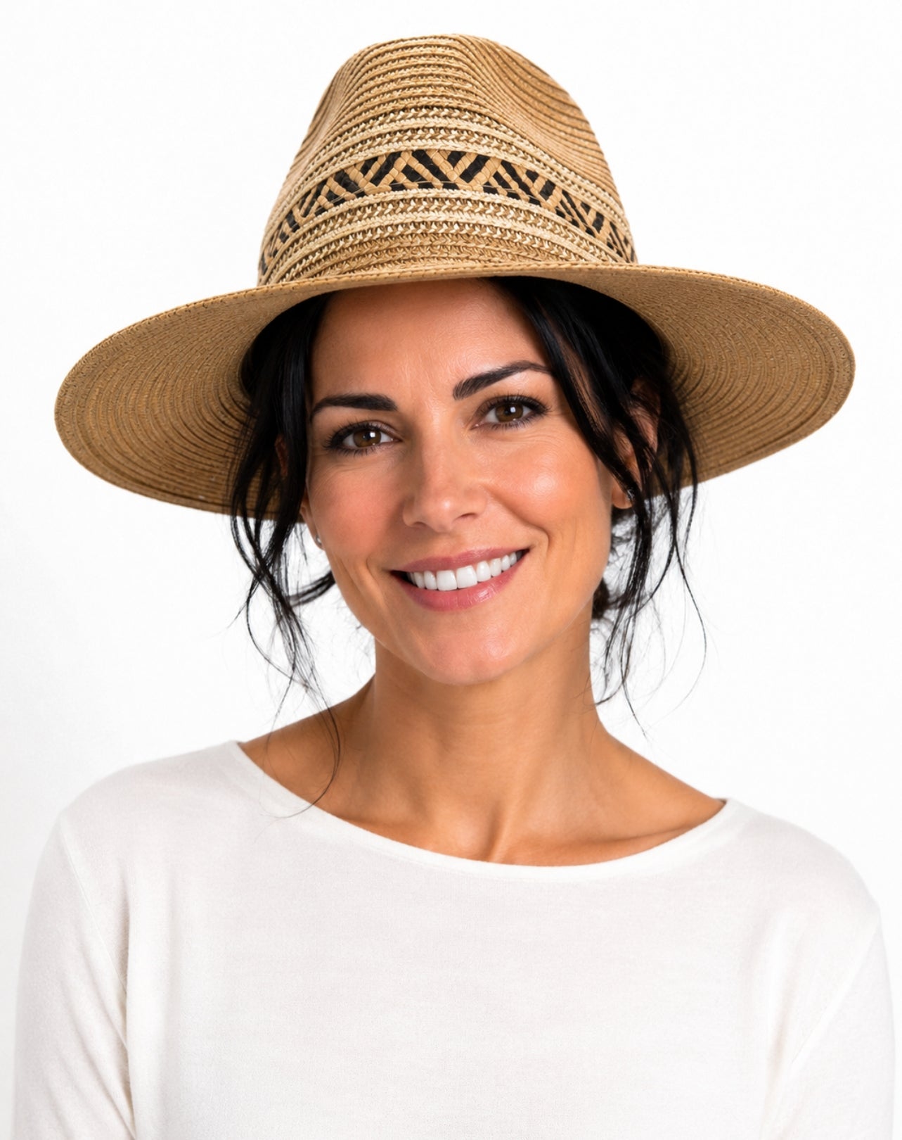 woman wearing fedora hat in sand beige