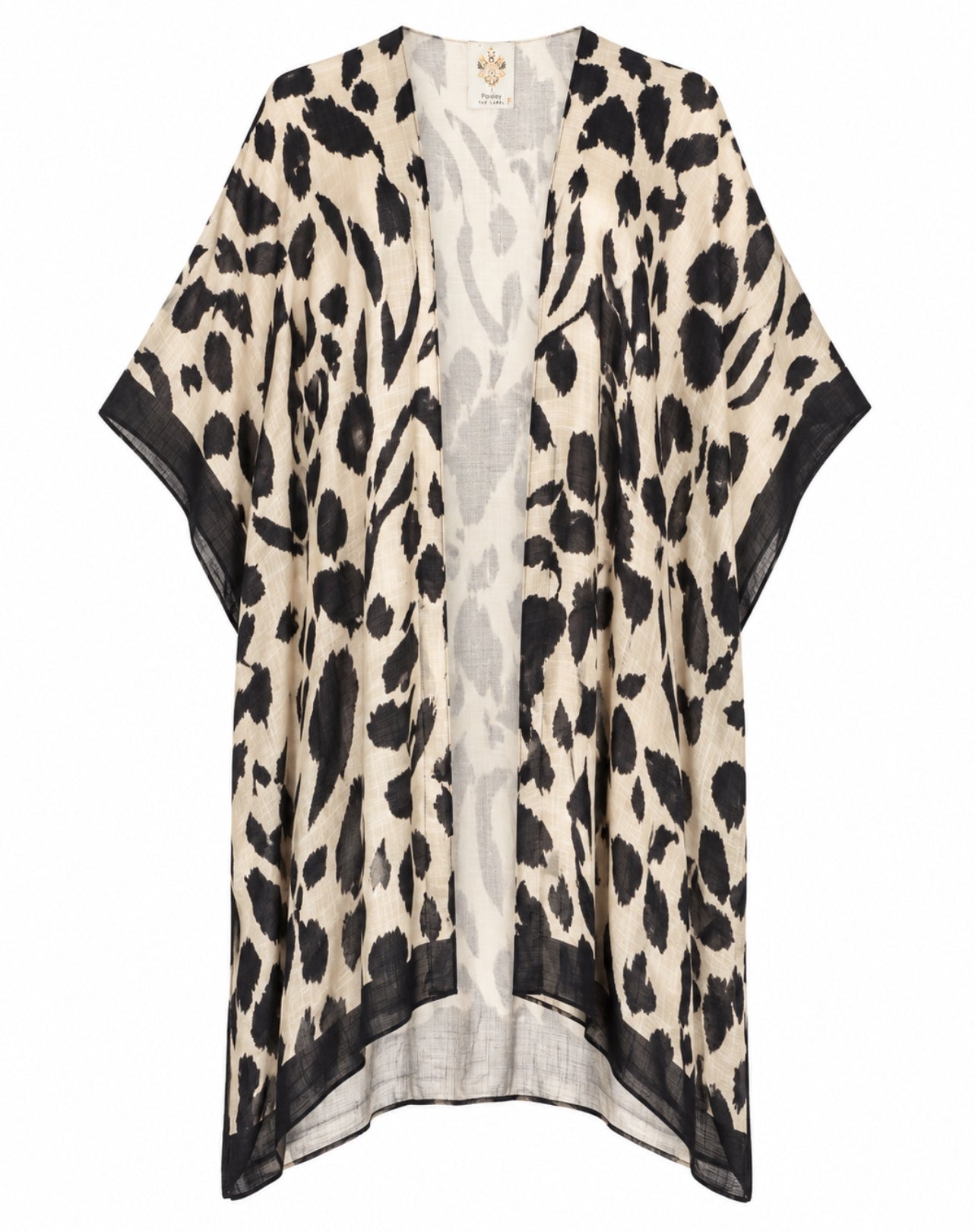A lightweight open-front kaftan or poncho-style cardigan with an abstract black and beige animal-inspired print, displayed on a clean white background.