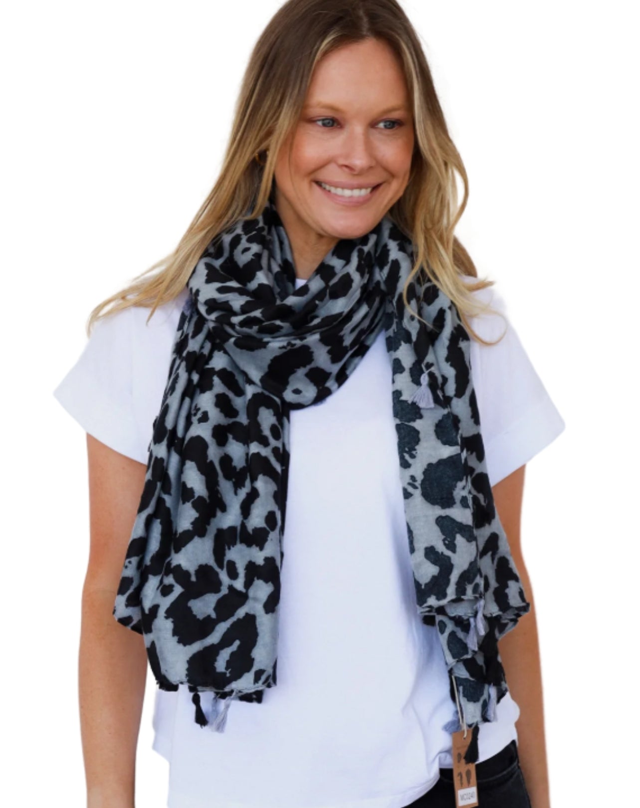 Woman wearing a leopard print scarf on a white background