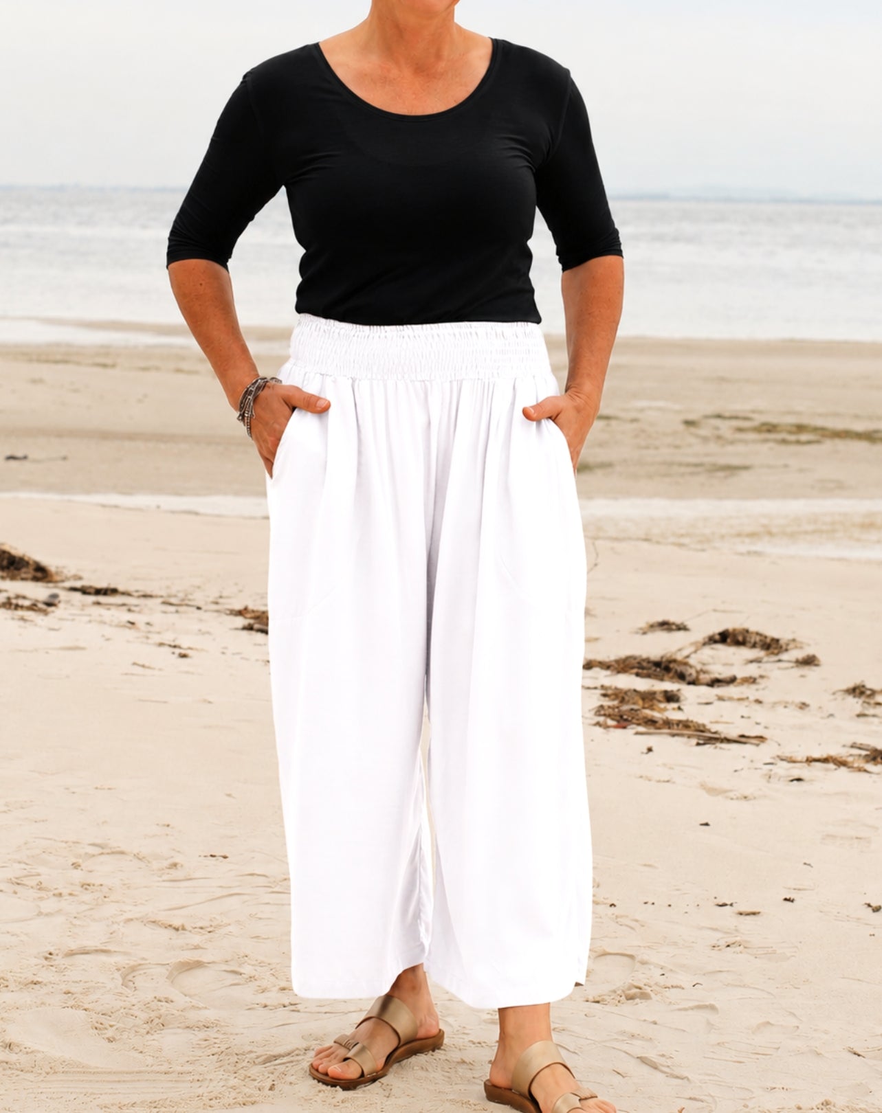black scoop tee with 3/4 sleeve worn with white everyday pant by miss seafari
