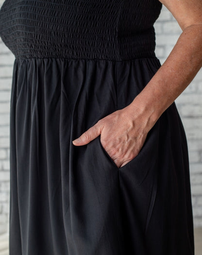 shirred black sundress showing pockets