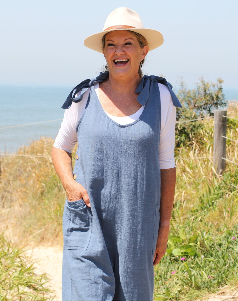 tiestrap jumpsuit in denim worn with scoop modal tee in white for winter