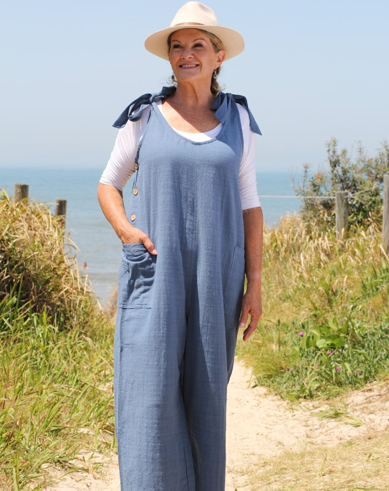 tiestrap jumpsuit in denim worn with scoop tee in white modal to become a all season jumpsuit. 