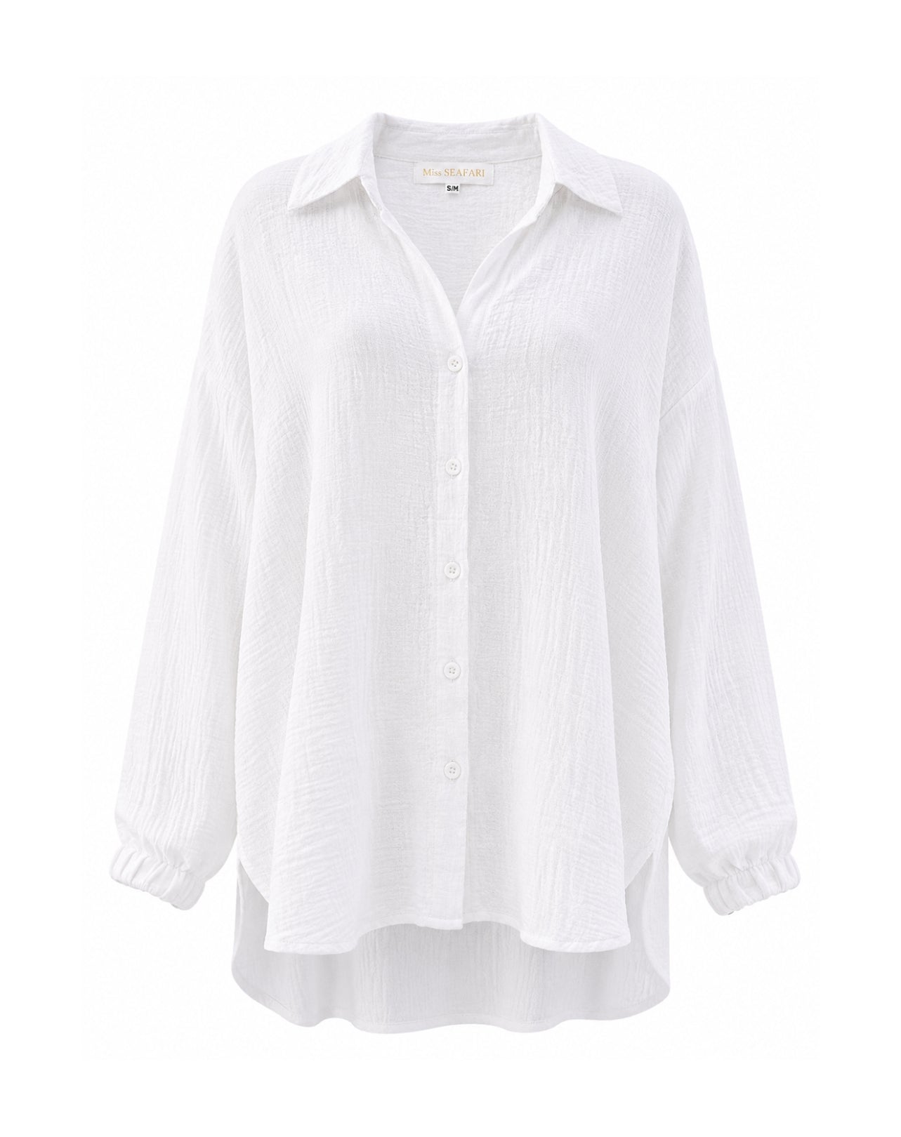 A white long-sleeve button-up shirt with a relaxed, oversized fit, featuring a pointed collar, subtle vertical crinkle texture, and elasticized cuffs, shown against a plain white background.