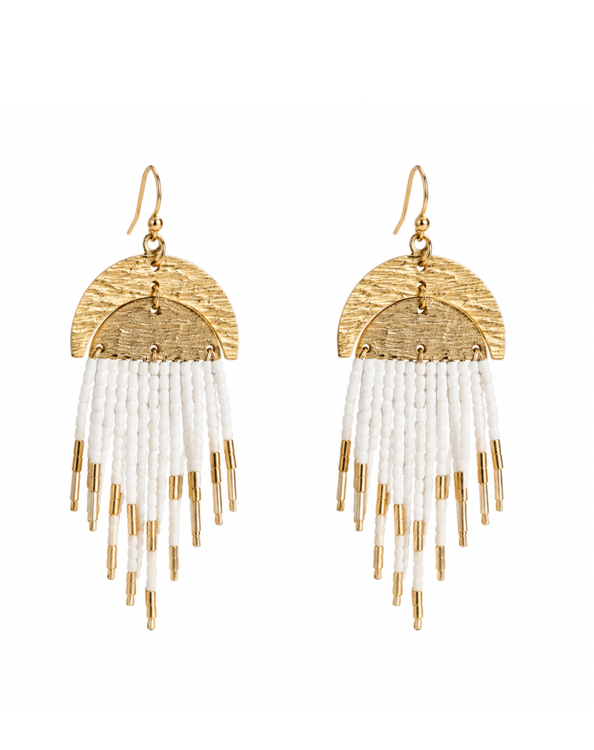 A pair of coastal chic gold and white beaded fringe dangle earrings on a plain white background.
