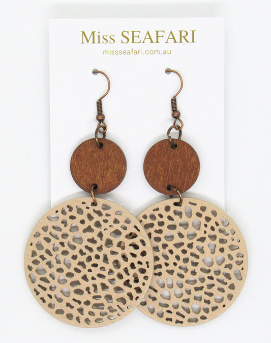 Wooden earrings with cut-out design on a white background with 'Miss SEAFARI' branding.